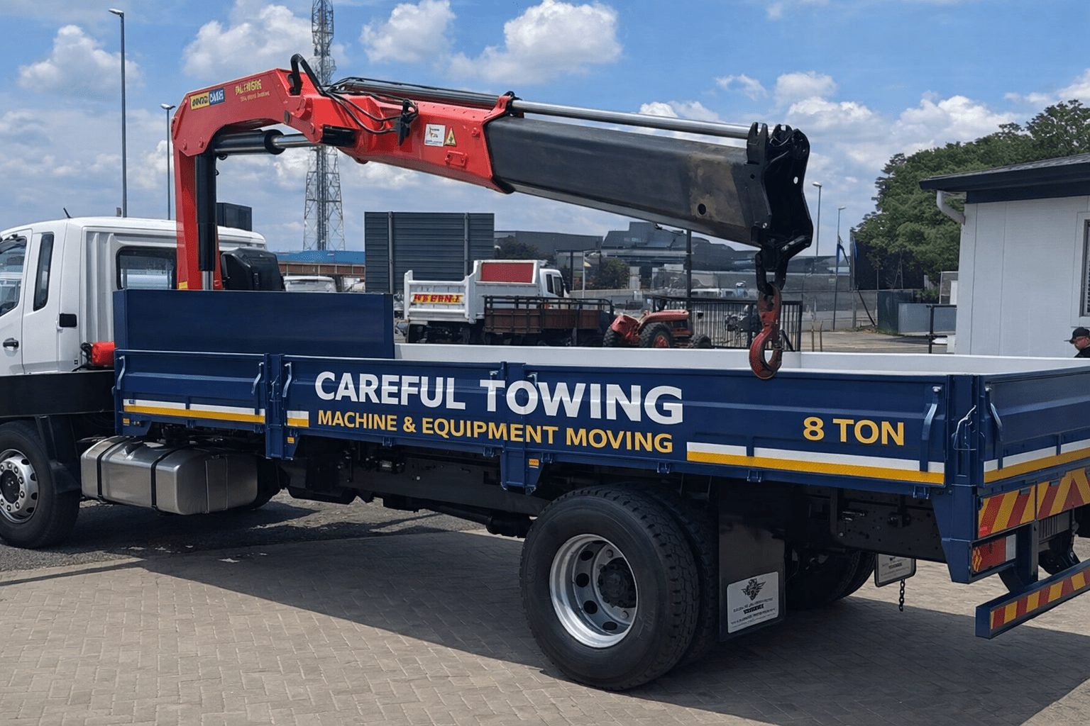 Careful Towing 8-ton crane truck moving heavy equipment in Gauteng